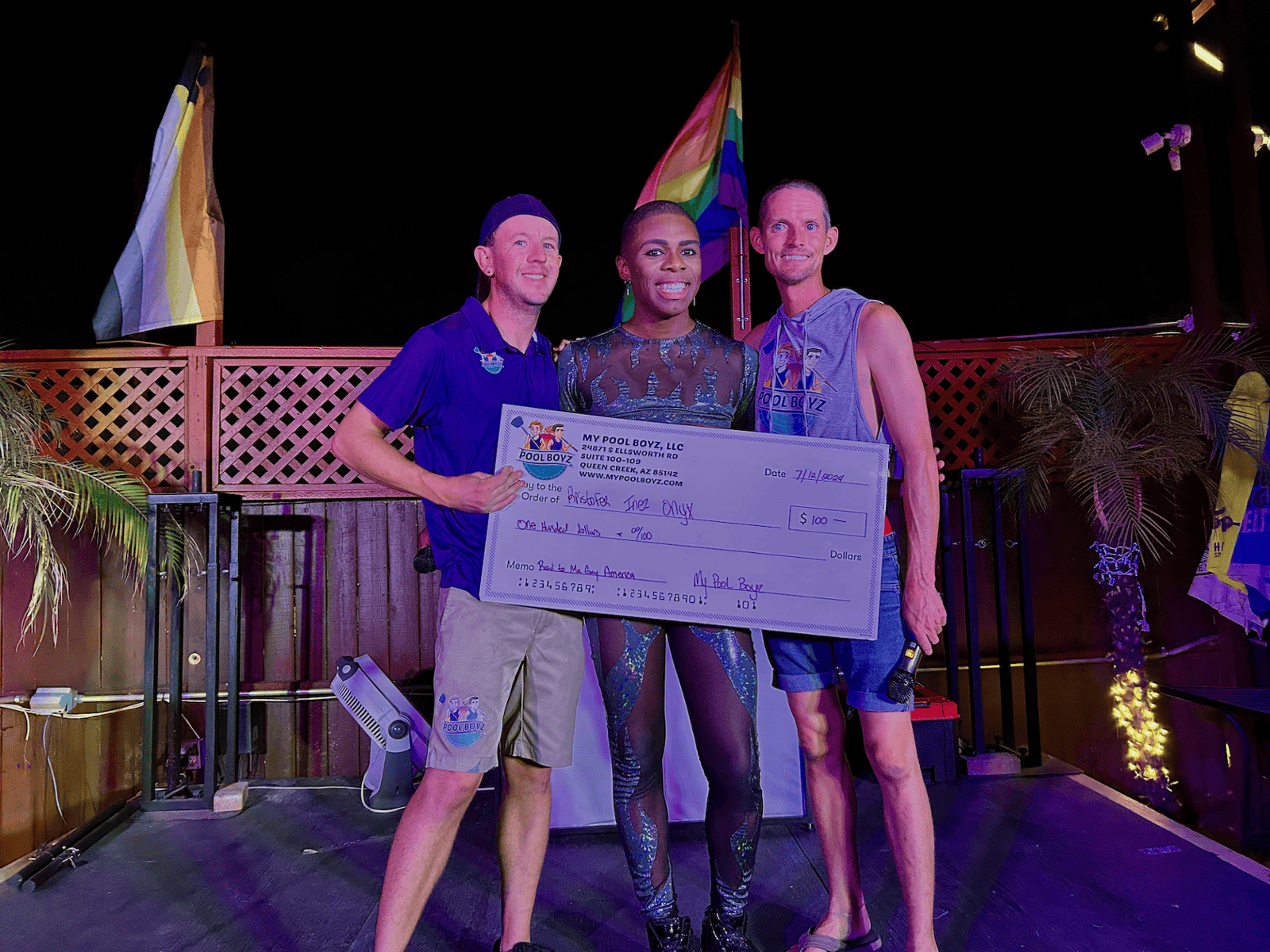 Phoenix arizona drag King being awarded 100 dollars by My Pool Boyz